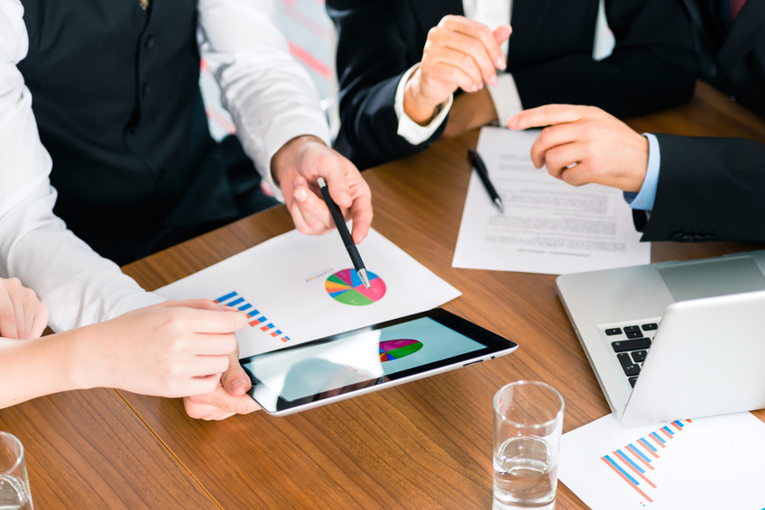 Business - Businesspeople working with tablet Computer