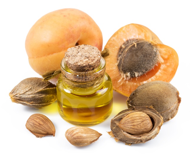 Apricot kernel oil and apricot kernels.